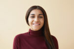 close-up-shot-friendly-looking-elegant-young-african-american-female-with-straight-dark-straight-hair-having-happy-joyful-look-posing.jpg